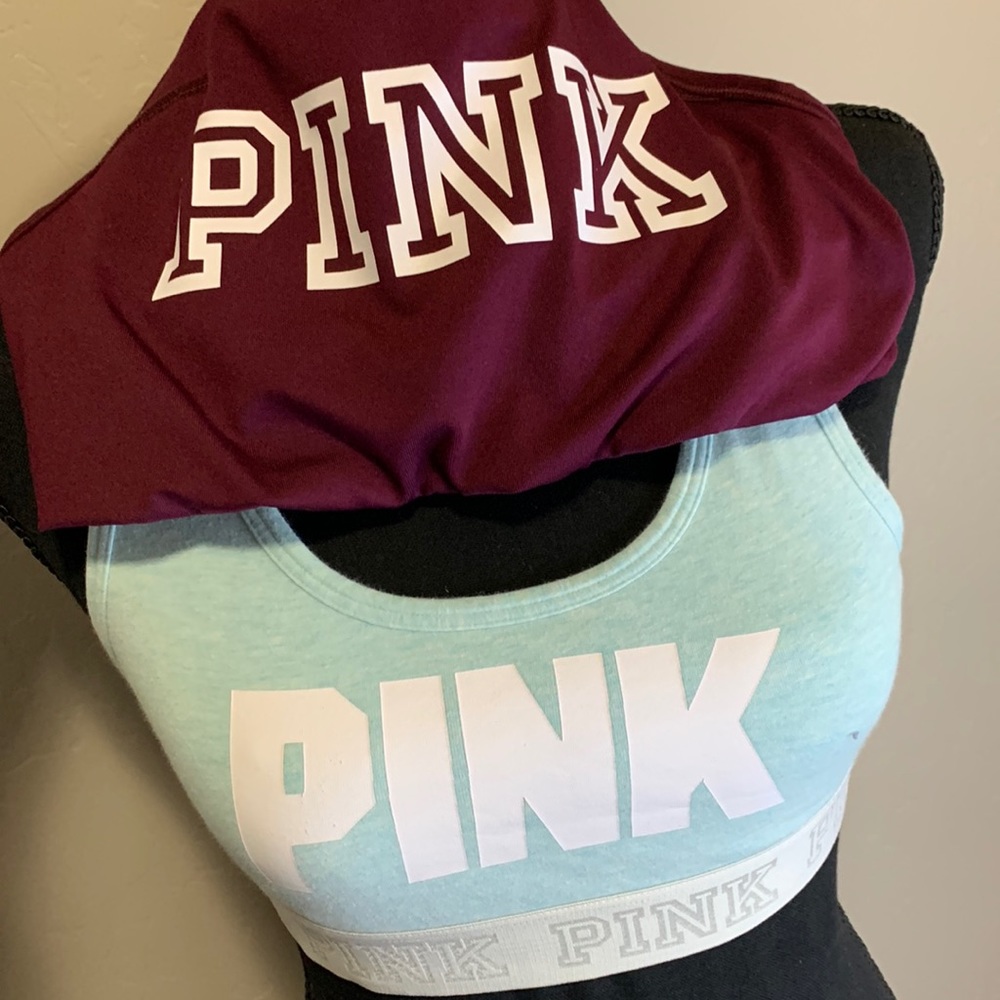 Pair of PINK sports bras